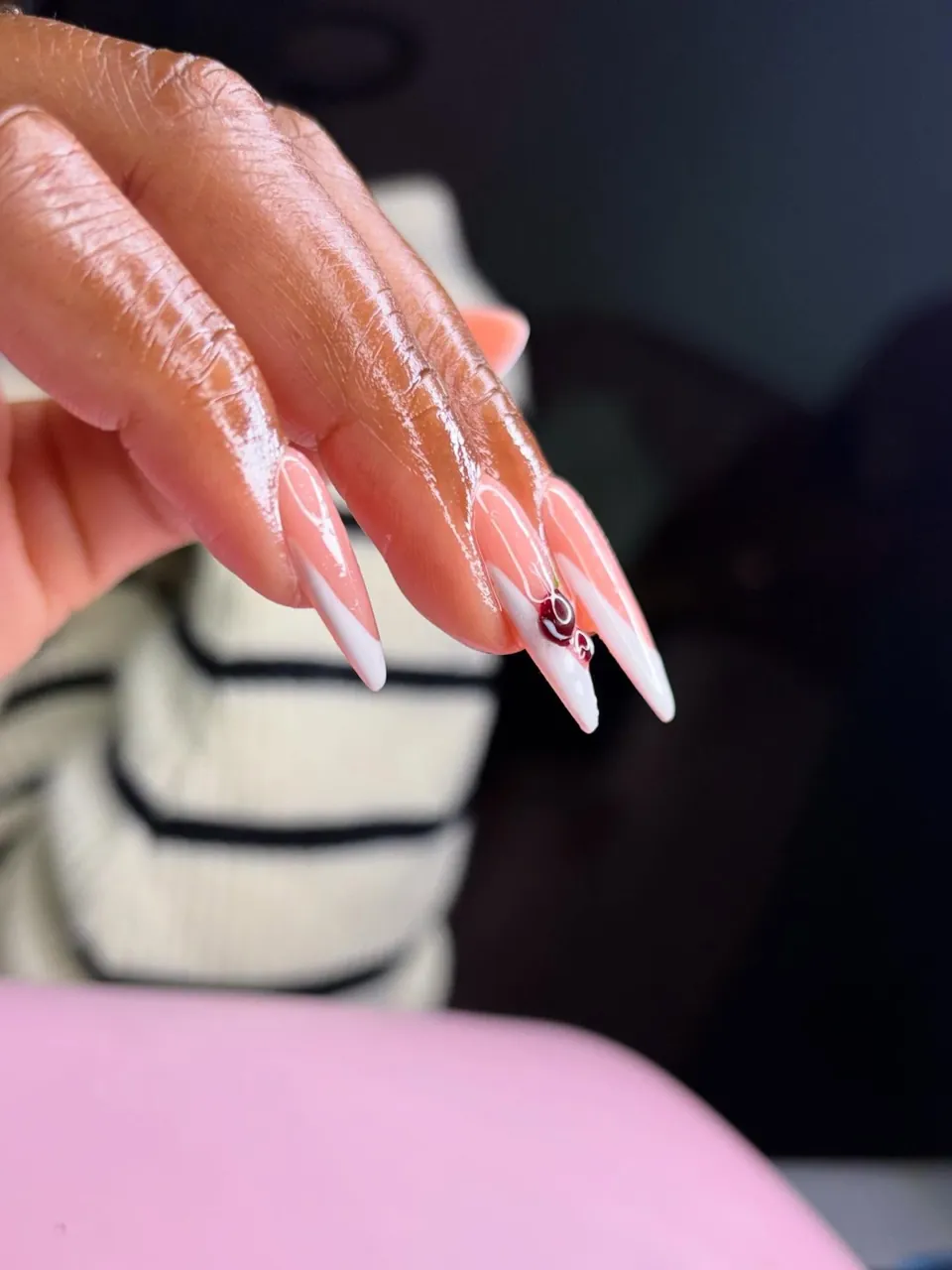 Stiletto nails with white French tips and hand-painted cherries